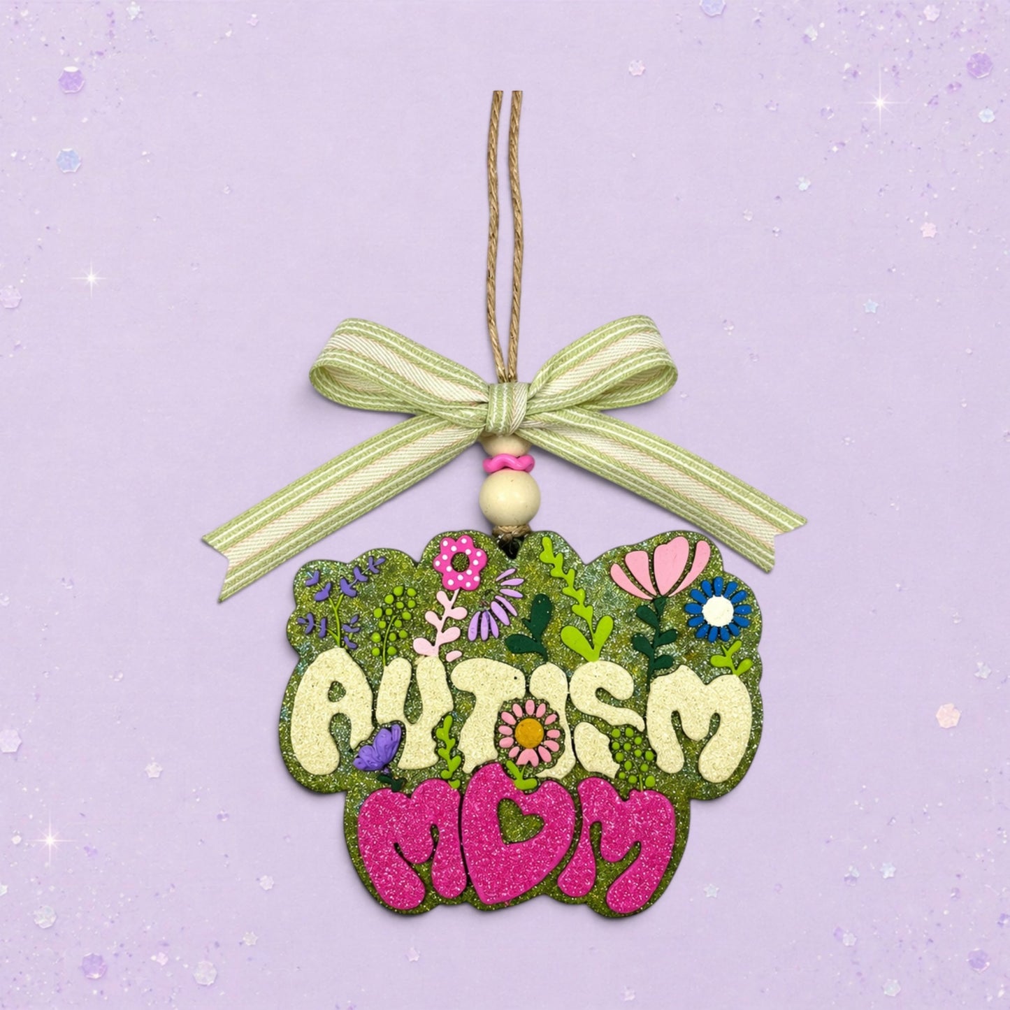 BeFreshie Autism Mom freshie with glittery green floral background and pink glitter letters.