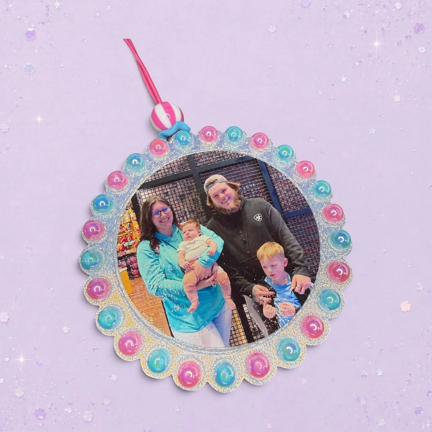 BeFreshie custom photo freshie ornament featuring a family of four with a baby. Colorful beaded border.