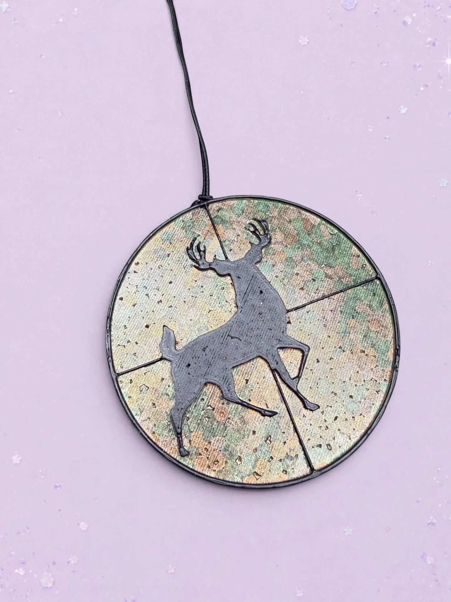 BeFreshie deer hunting target car freshie with a black silhouette deer on a rustic camouflage background
