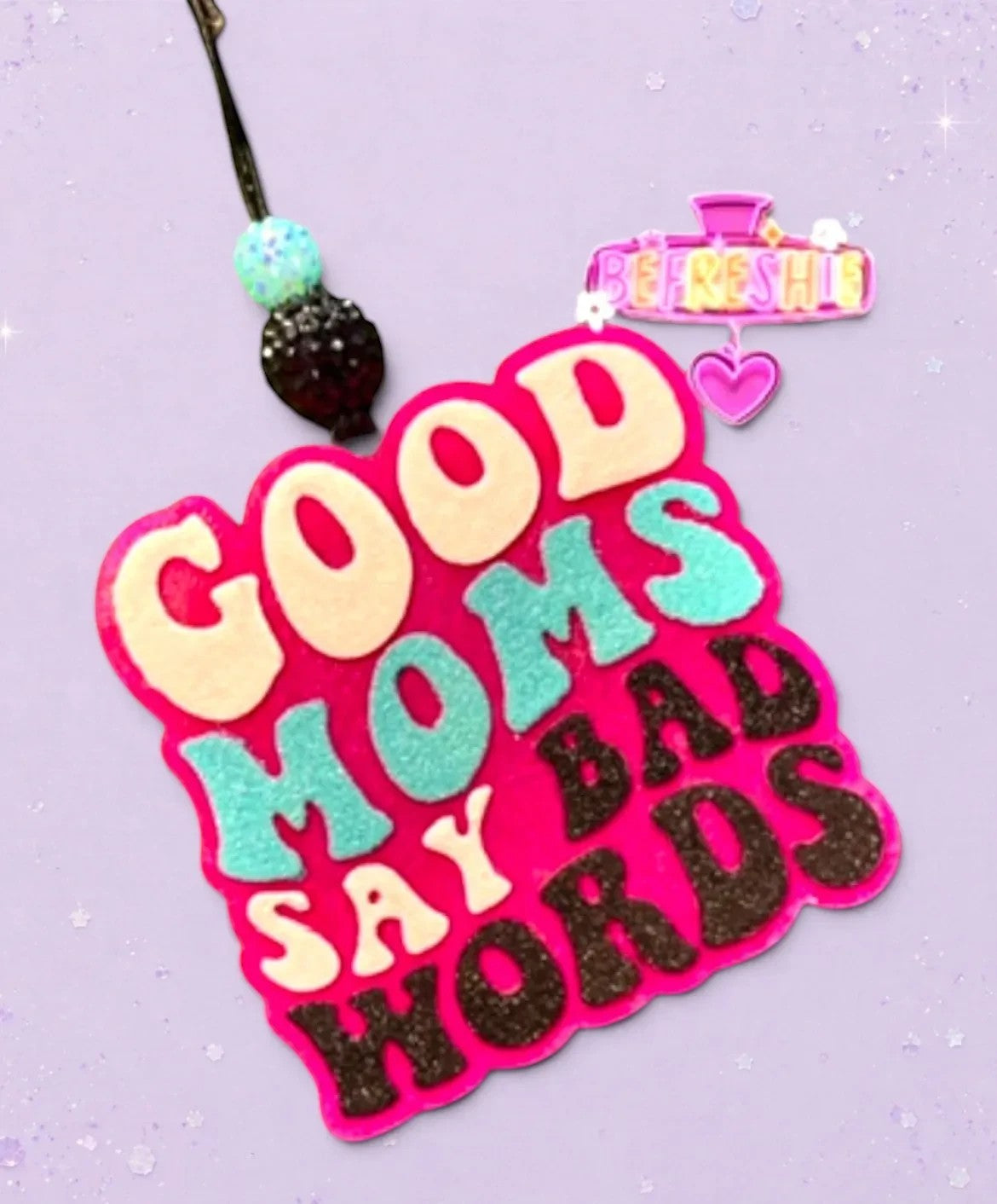 BeFreshie pink car freshie with "Good Moms Say Bad Words" in cream, teal, and glitter black letters.