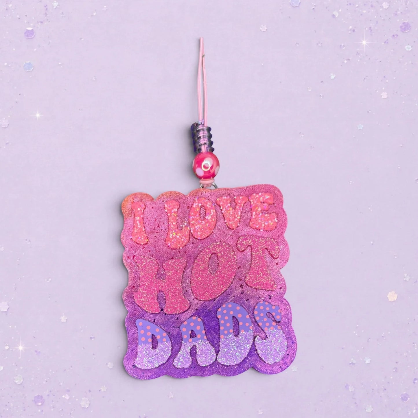 BeFreshie I Love Hot Dads glitter air freshener with pink, purple, and orange ombre and polka dot accents.