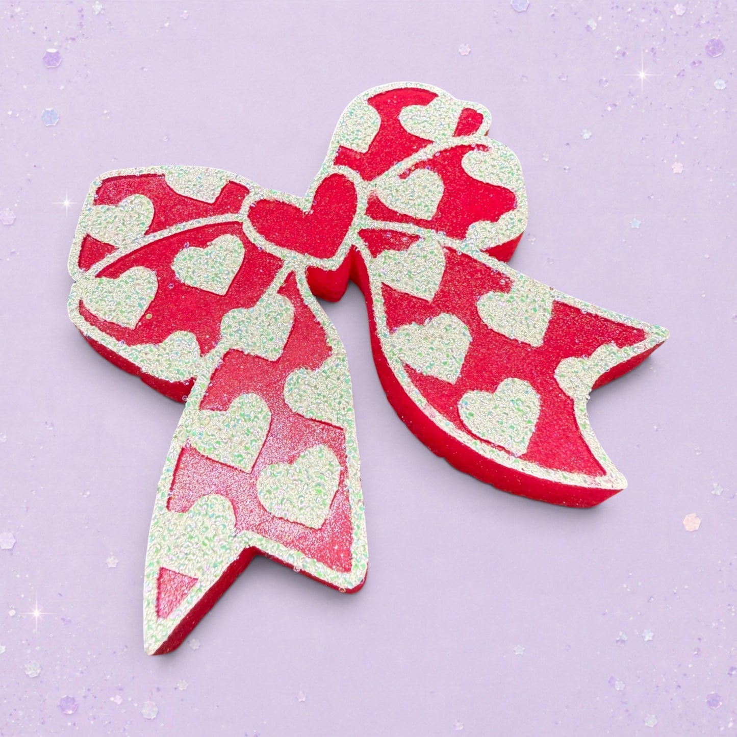 BeFreshie red bow freshie with white glitter hearts and a glittery edge.