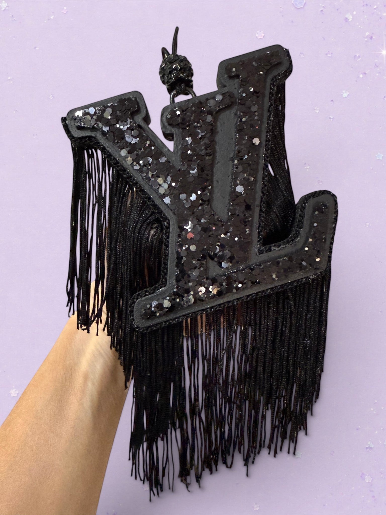 BeFreshie black LV logo car air freshener featuring sparkling sequins and long decorative fringe tassels