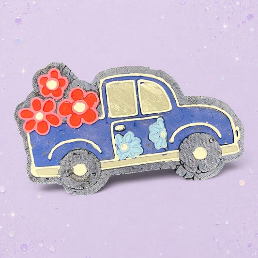 BeFreshie blue truck car freshie with red and light blue flowers on a light purple glitter background