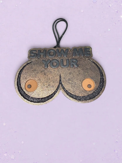 BeFreshie Show Me Your **** car air freshener in a glittery bronze finish with a black hanging cord.