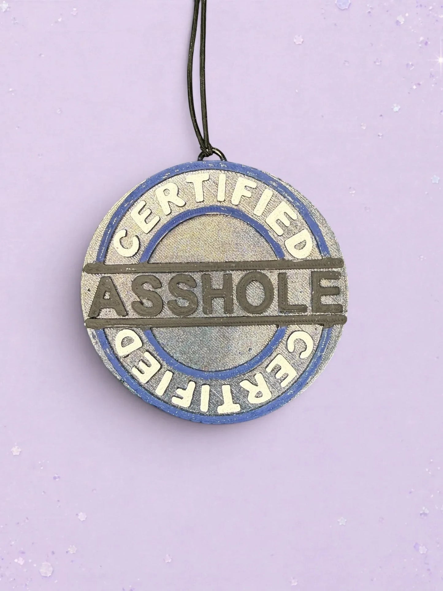 BeFreshie Certified Asshole car air freshener in a round blue and silver design with bold embossed lettering.
