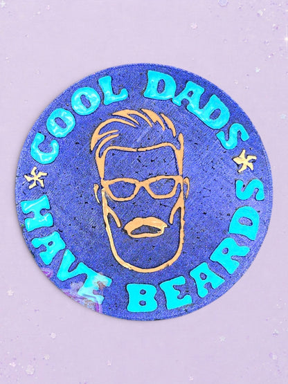 BeFreshie Cool Dads Have Beards car freshie featuring a blue circular design with a gold bearded man icon and text.