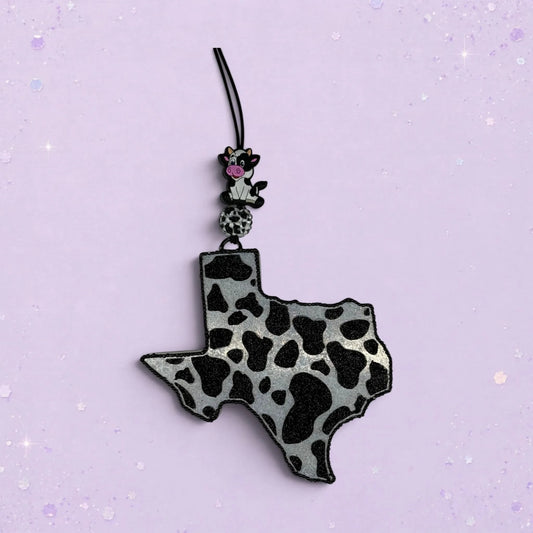 BeFreshie Cowprint Texas freshie in black and silver with a small cow charm.