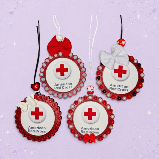 BeFreshie custom American Red Cross logo car freshie with red and white accents and decorative bows.