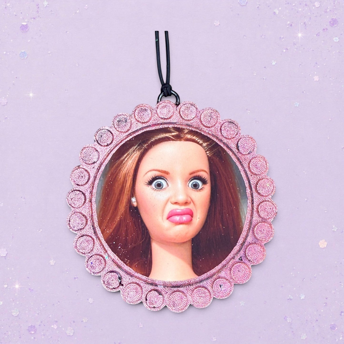 BeFreshie custom photo air freshener with a funny doll face in a pink glittery frame. Scented car accessory.