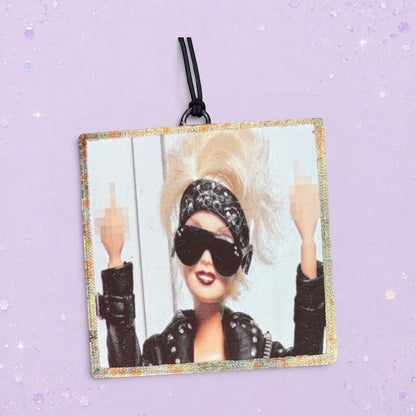 BeFreshie custom photo air freshener featuring a doll with blonde hair, sunglasses, and a bandana, holding up middle fingers.