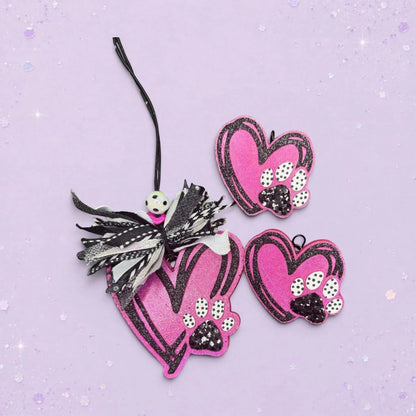 BeFreshie pink glitter heart freshies with black paw prints and decorative ribbon.