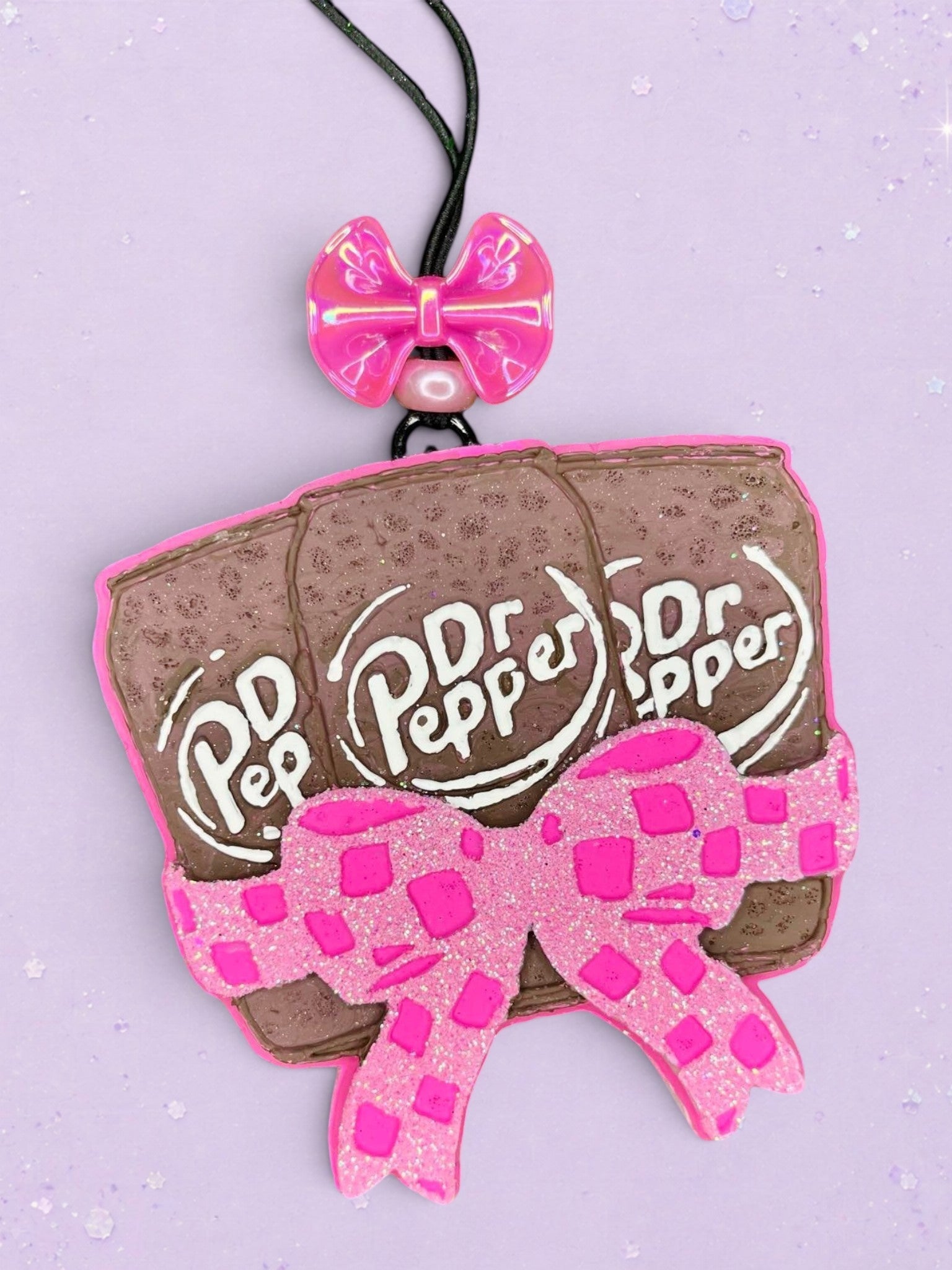 BeFreshie 3 Dr Pepper soda can car freshie featuring a glittery pink bow and a small pink bow accent on a purple background