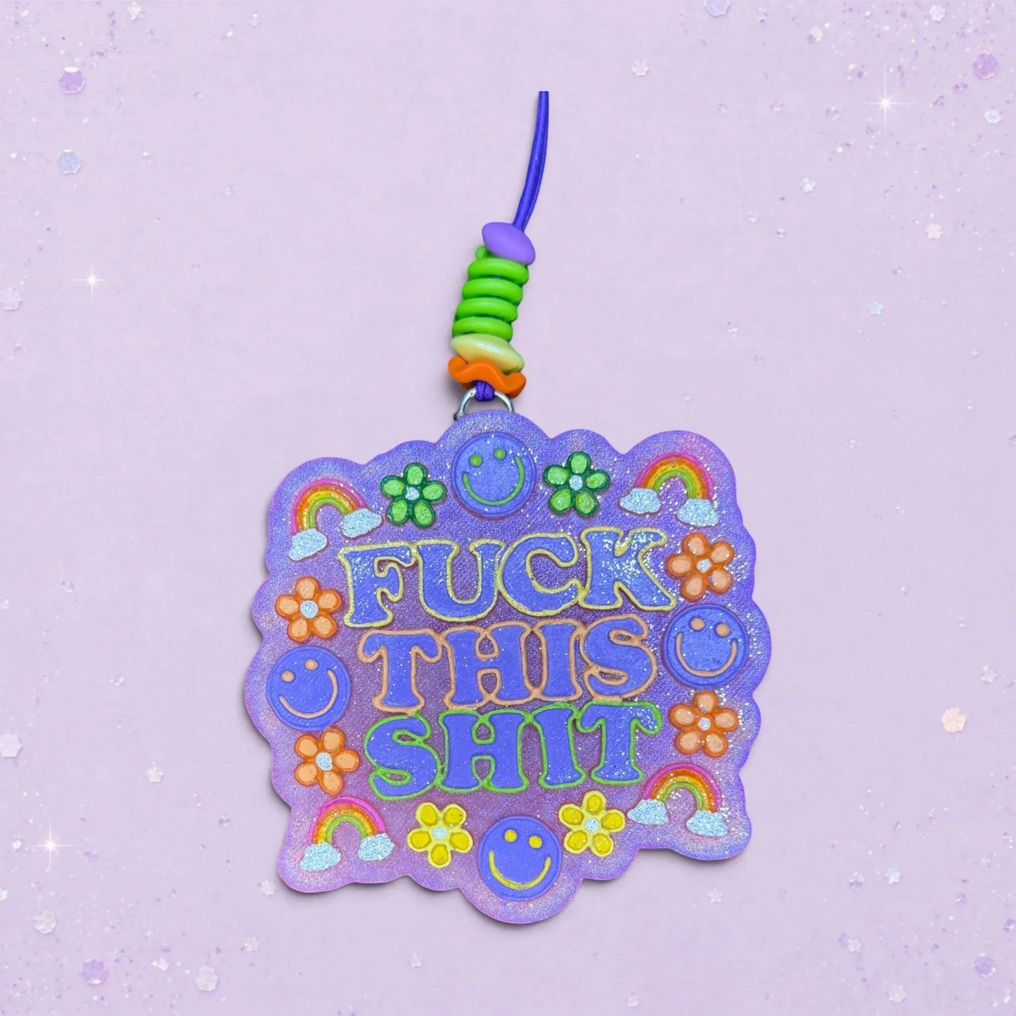 BeFreshie Fuck This Shit freshie with purple glitter, smiley faces, flowers, and rainbows. Includes beaded hanger.