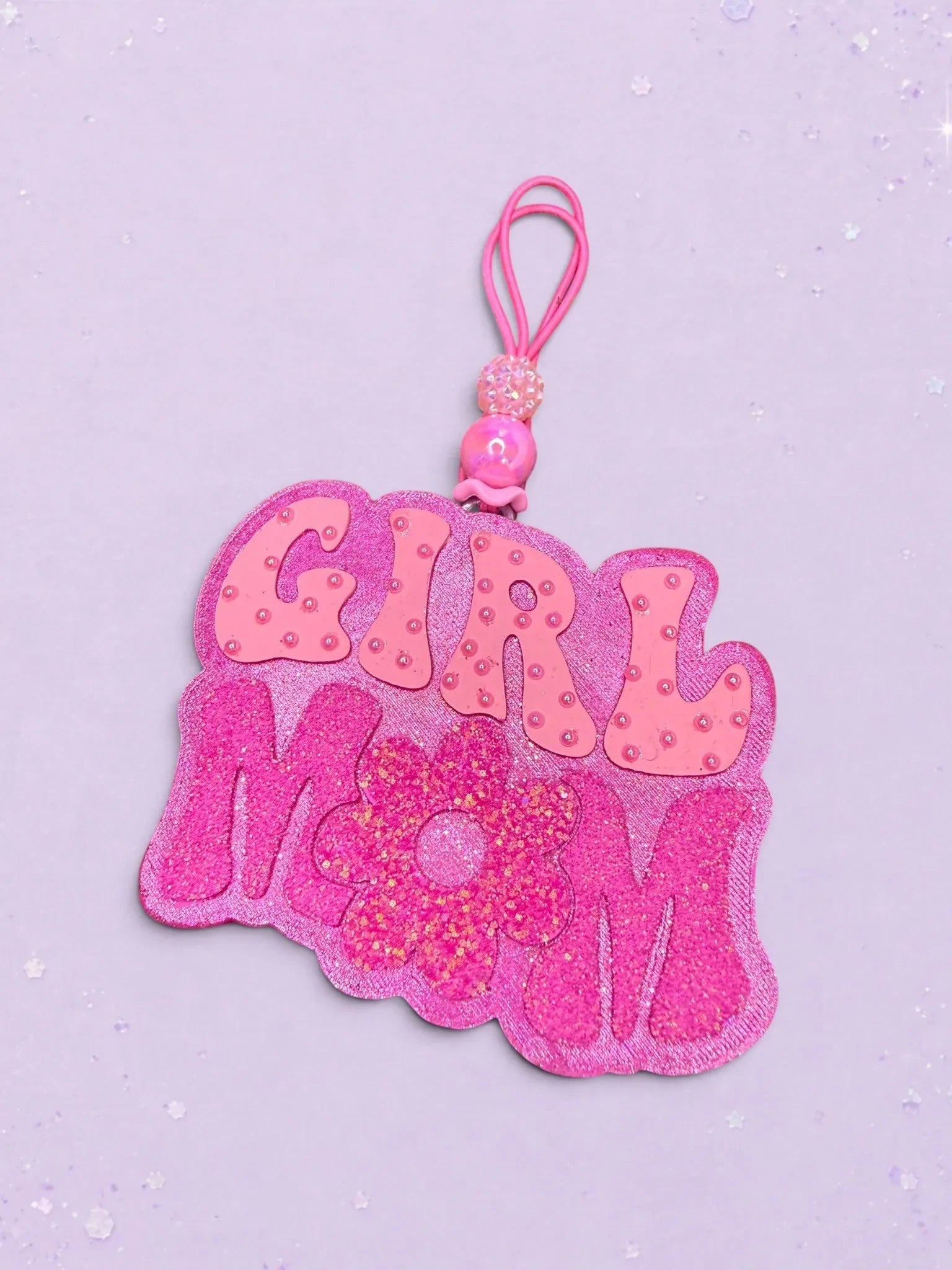 BeFreshie Girl Mom car freshie in shades of pink with glittery flower detail and a decorative beaded hanging loop