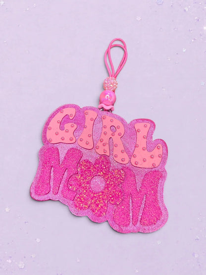 BeFreshie Girl Mom car freshie in shades of pink with glittery flower detail and a decorative beaded hanging loop
