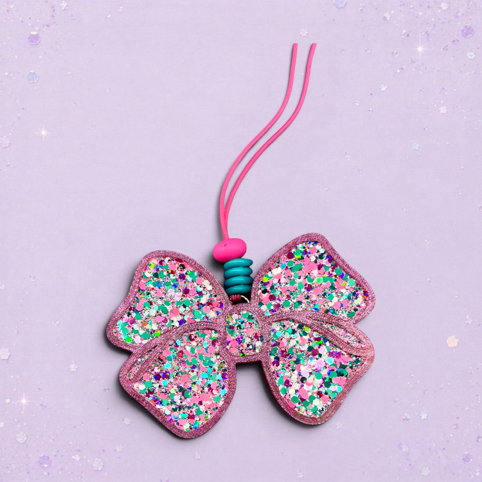 BeFreshie glitter bow freshie with pink cord and teal beads. Feminine car accessory.