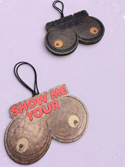 BeFreshie Show Me Your **** car air fresheners in bronze and black glitter with hanging elastic cords