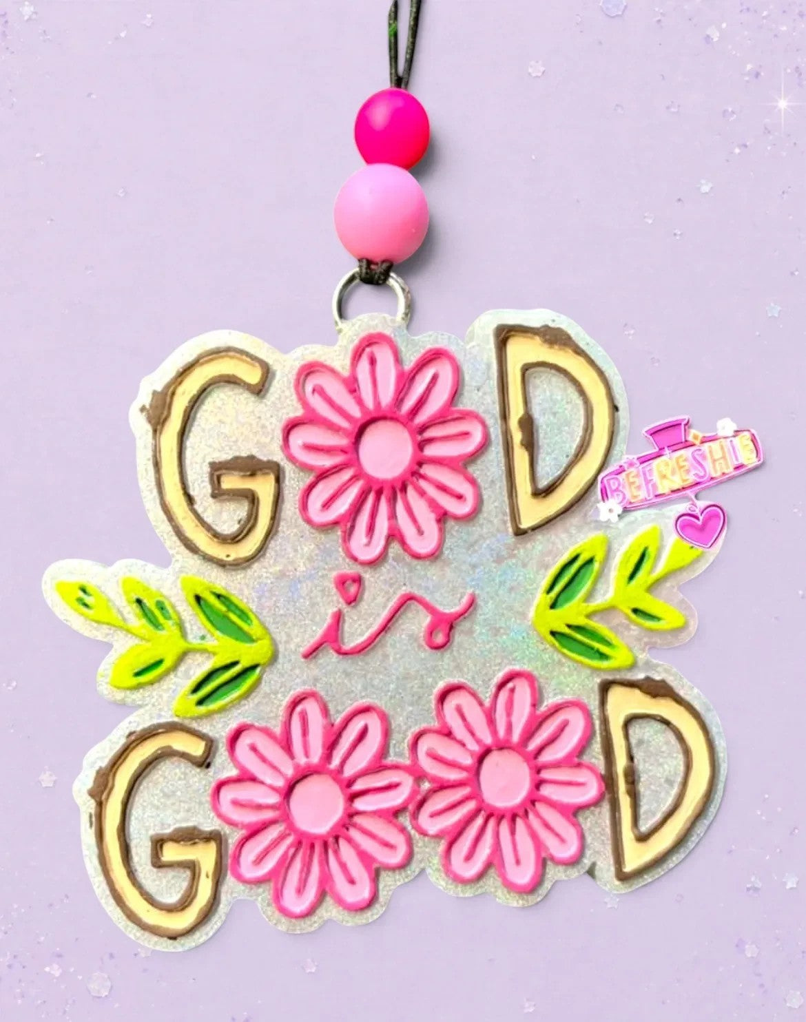 BeFreshie God Is Good car freshie with pink flowers and green leaves, hanging with pink beads.