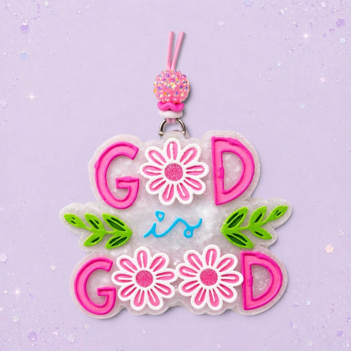 BeFreshie God Is Good freshie with pink lettering, white flowers, green leaves, and a sparkly pink bead.