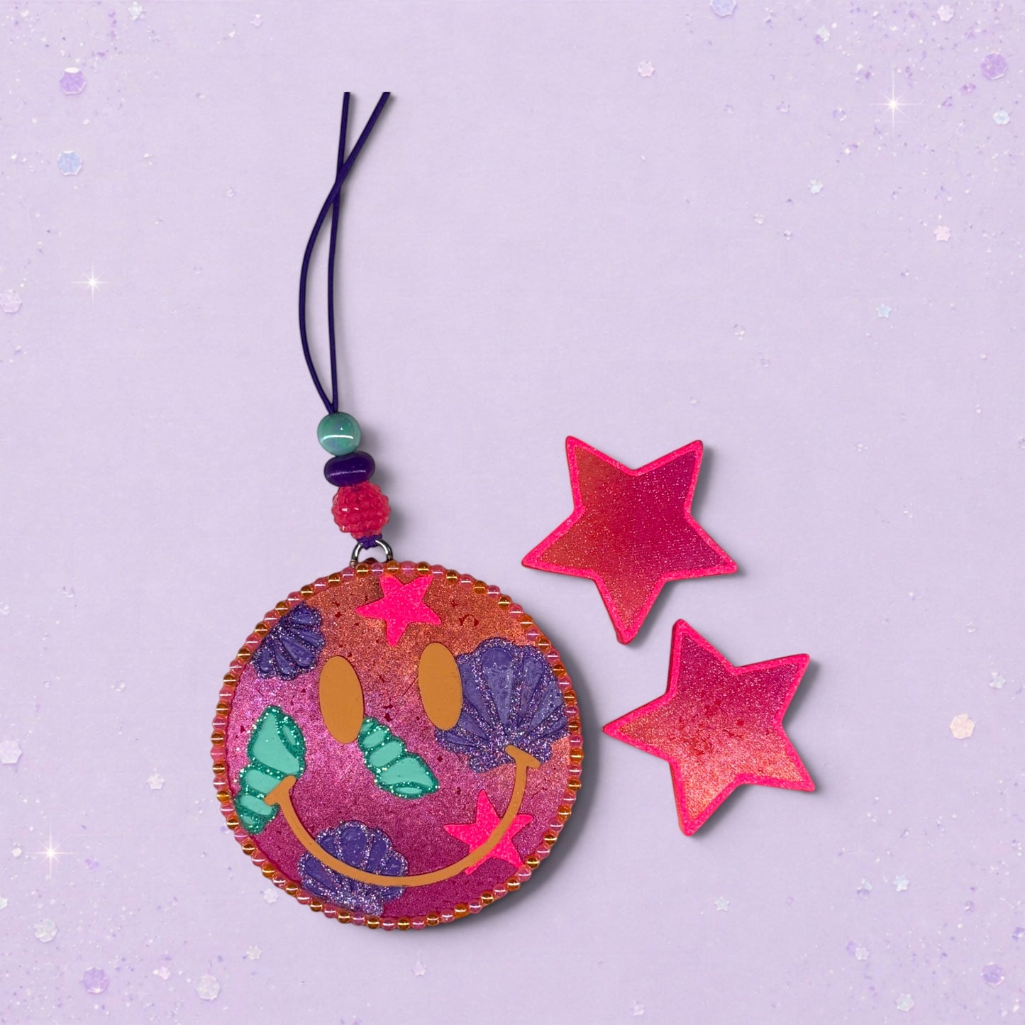BeFreshie Happy Face Shells freshie with pink stars and beaded hanger. Features a smiling face with shell accents.