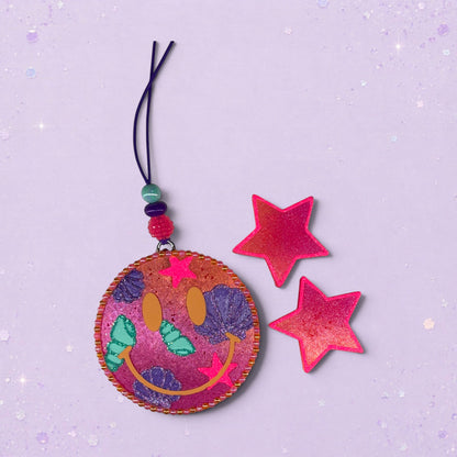 BeFreshie Happy Face Shells freshie with pink stars and beaded hanger. Features a smiling face with shell accents.