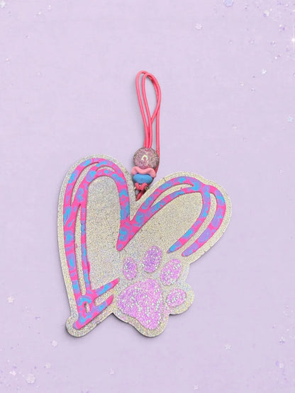 BeFreshie heart-shaped car freshie with a glittery paw print, featuring blue and pink doodle accents and a pink loop.