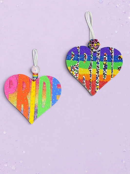 BeFreshie Heart PRIDE freshies featuring rainbow glitter, leopard print accents, and decorative beads on a purple background.