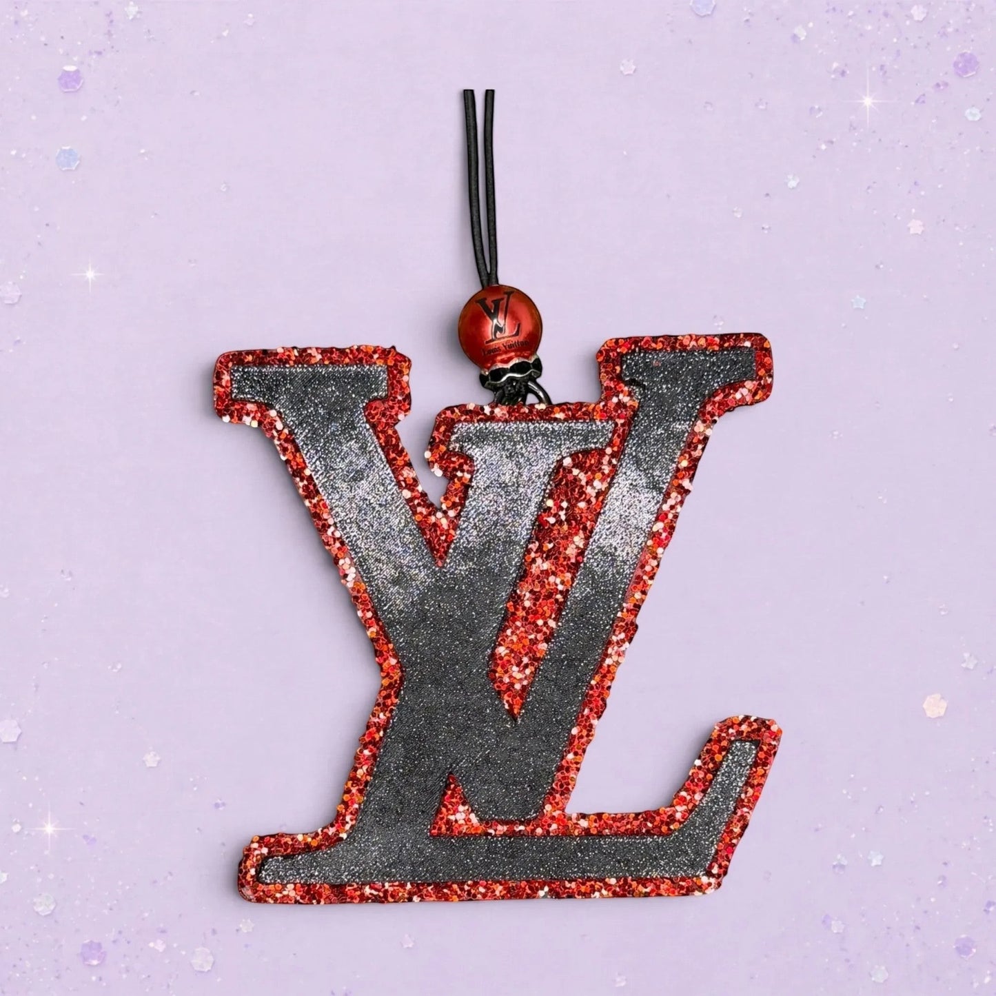 BeFreshie LV freshie air freshener, black with red glitter trim and hanging loop.