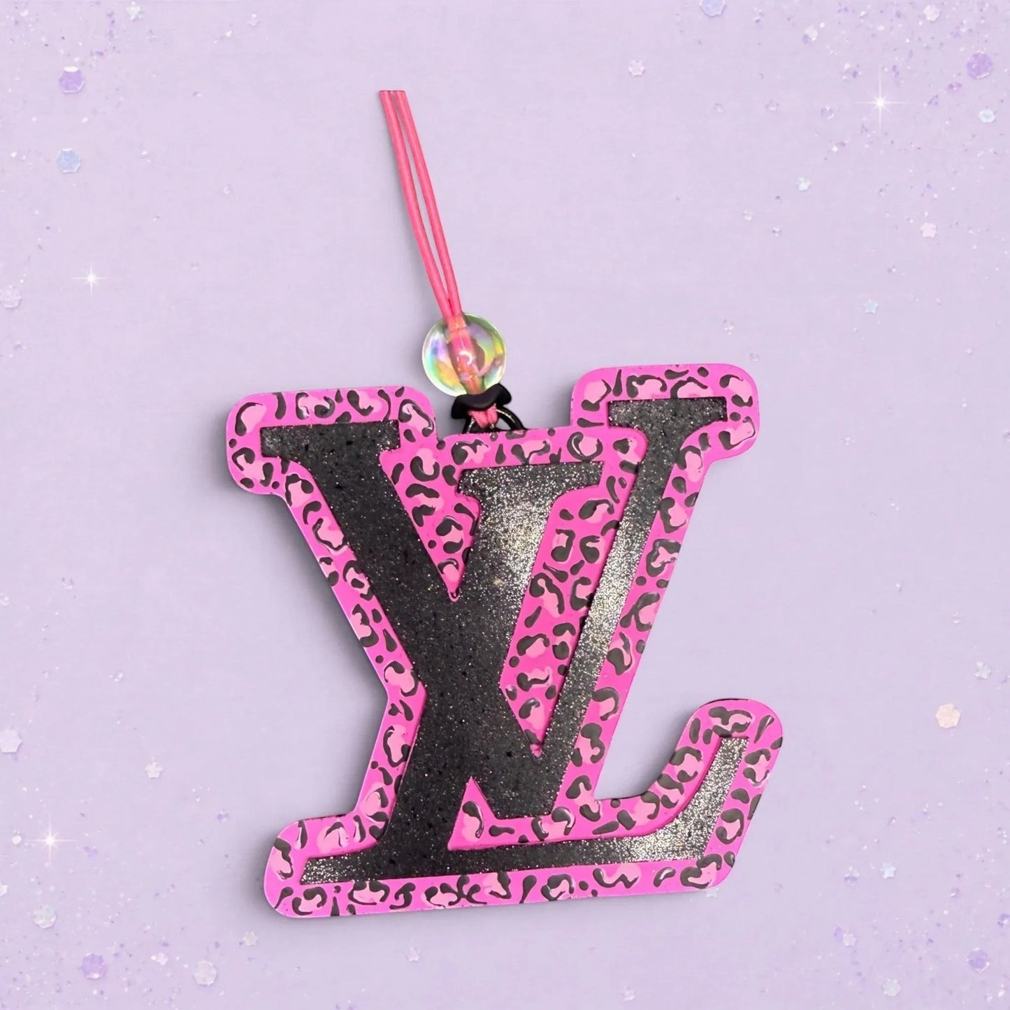 BeFreshie pink and black leopard print LV freshie with glitter accents and pink hanging string.