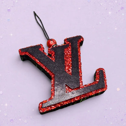 BeFreshie black LV freshie with red glitter trim and hanging loop. Adds personality and fun.