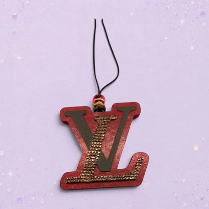 BeFreshie red LV freshie with gold rhinestones and a black cord hanger with beaded accent.
