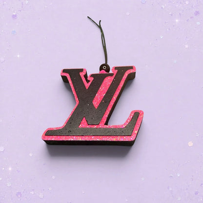 BeFreshie LV logo car air freshener in black and glittery pink on a light purple background