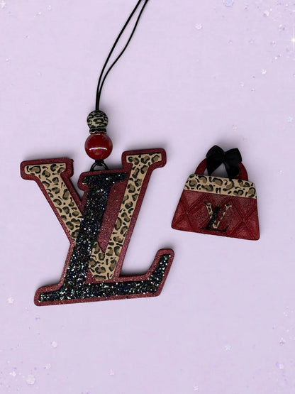 BeFreshie LV freshie car air freshener featuring leopard print, red glitter, and a matching miniature handbag charm.