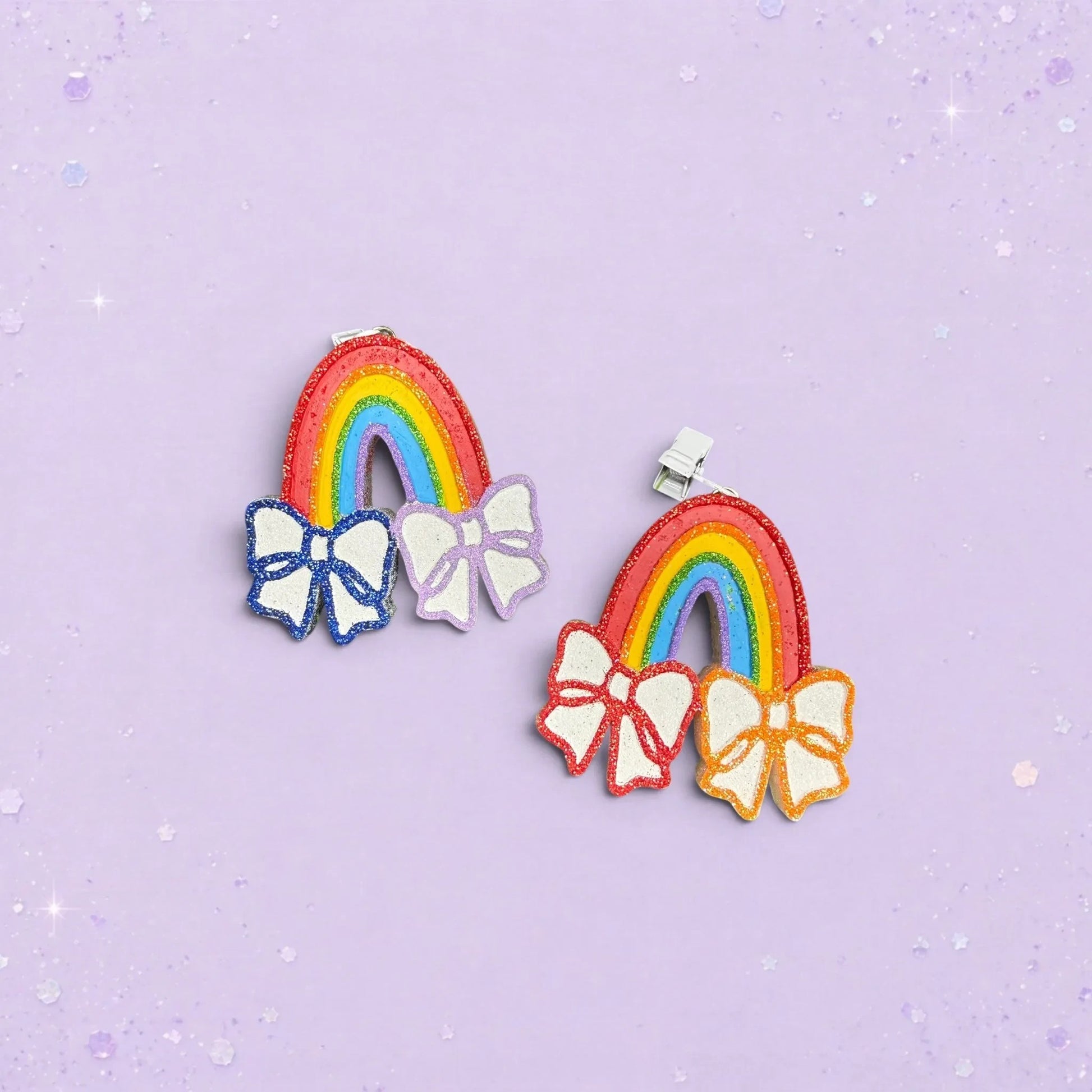 BeFreshie mini rainbow car vent clips with glittery bows in vibrant colors on a light purple background