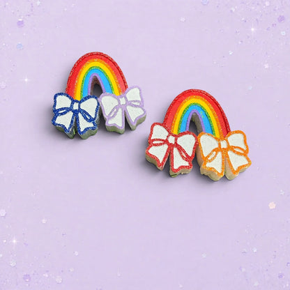 BeFreshie mini rainbow car vent clips with glittery bows in vibrant colors on a light purple background