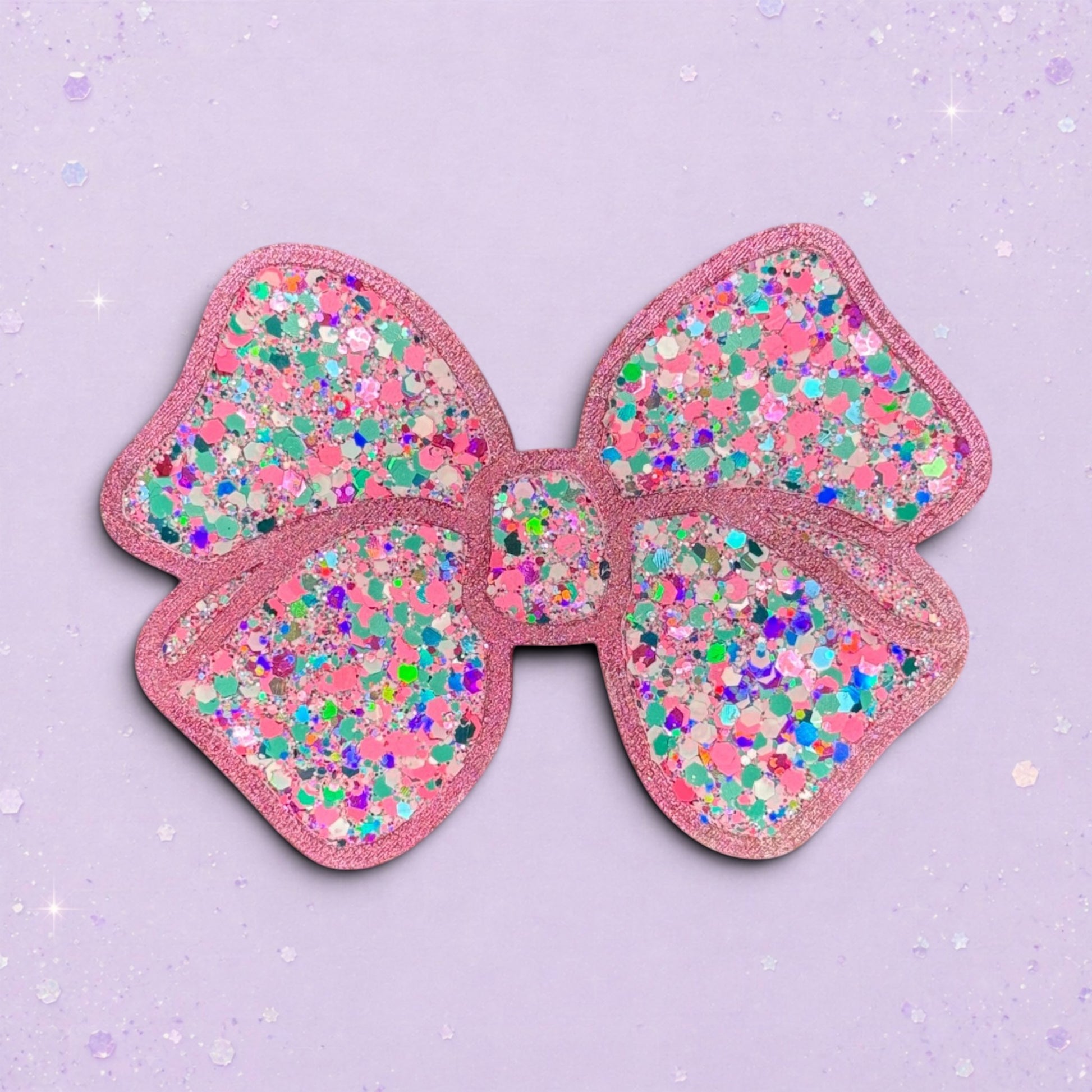 BeFreshie pink glitter bow with multi-colored confetti accents. Feminine and sparkly accessory.