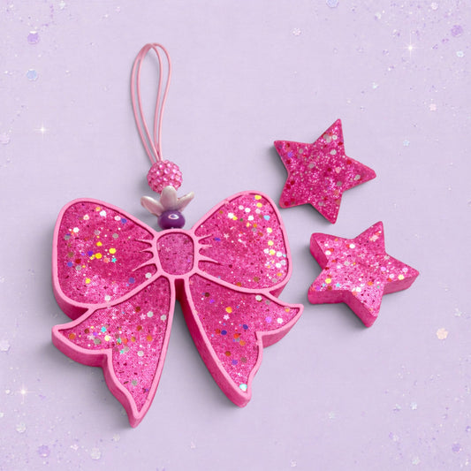 BeFreshie pink glitter bow freshie with matching stars. A fun accessory for adding personality.