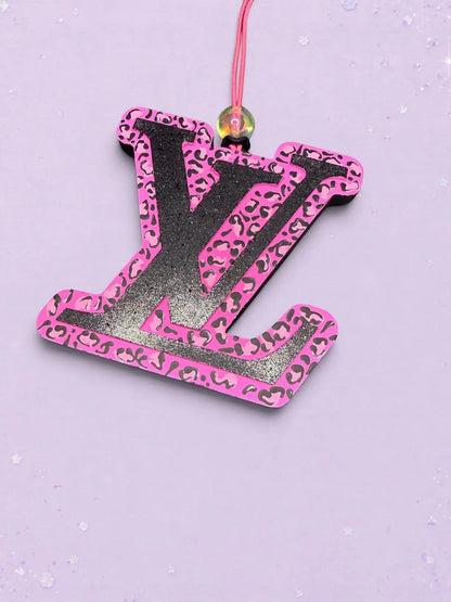 BeFreshie pink and black leopard print LV logo car air freshener with a hanging string and decorative bead