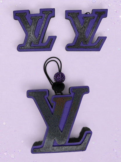 BeFreshie purple and black LV logo car air freshener with a decorative beaded hanging loop