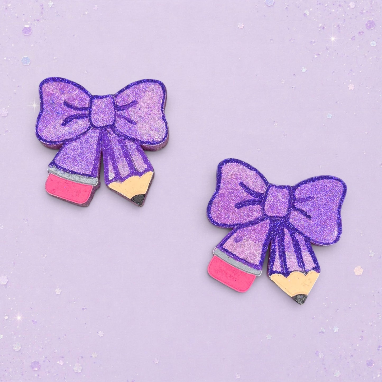 BeFreshie purple glitter bow shaped pencil freshie with pink eraser and yellow pencil body.