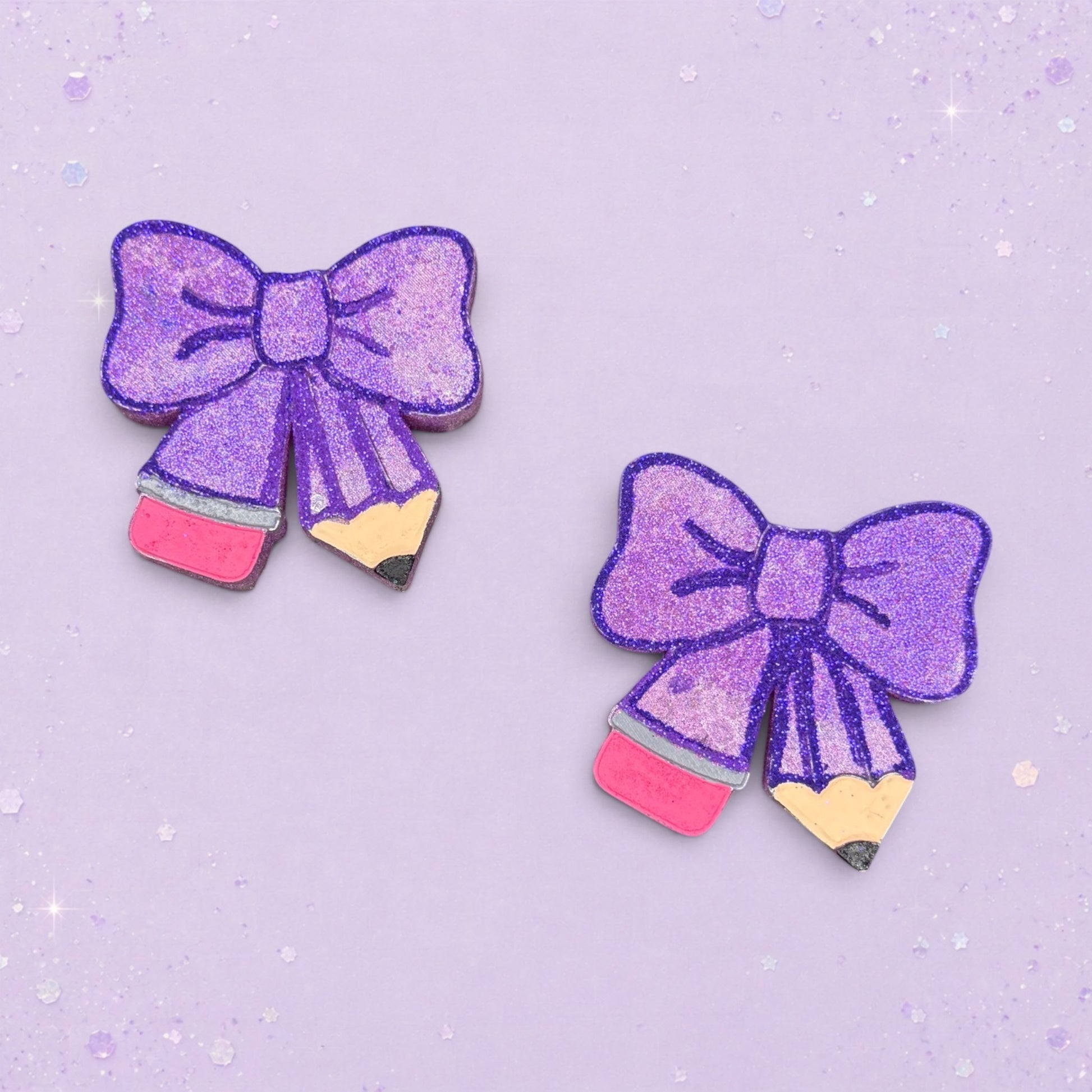 BeFreshie purple glitter bow shaped pencil freshie with pink eraser and yellow pencil body.