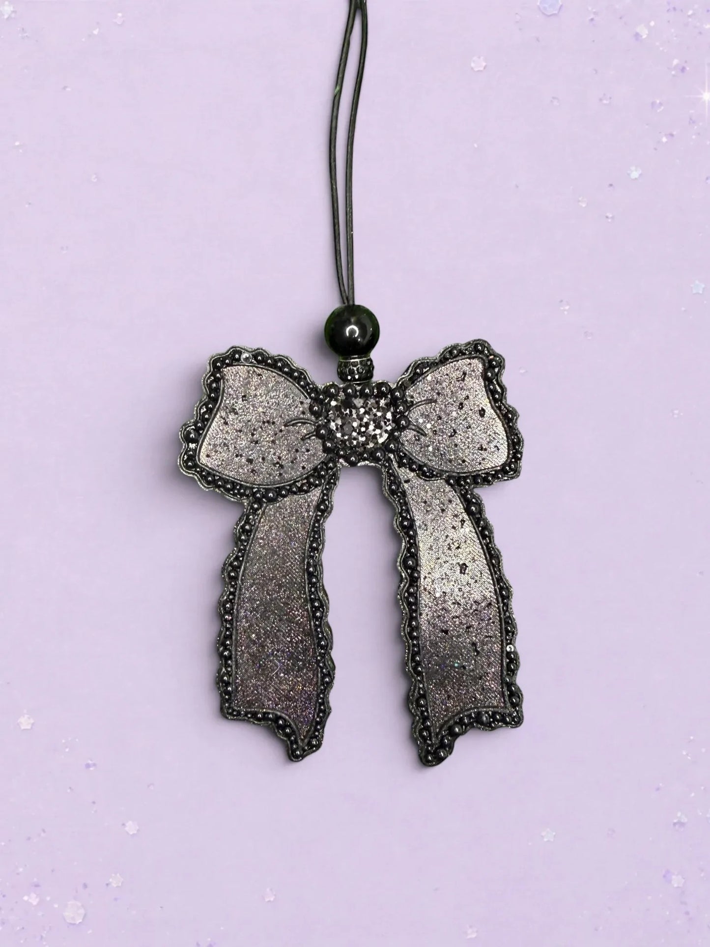 BeFreshie Scallop Bow long tails car freshie in shimmering black with beaded edges and a black hanging cord.