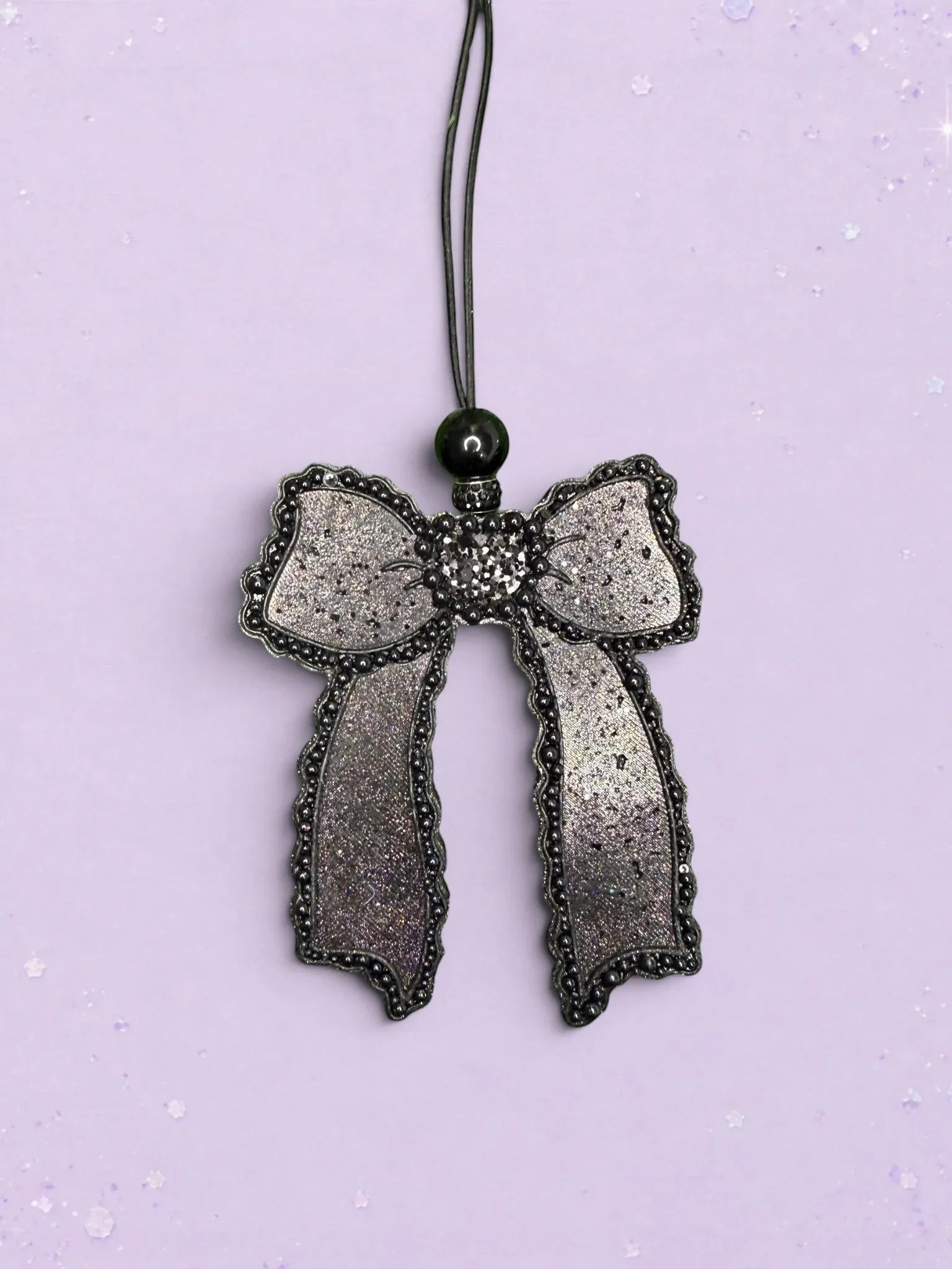 BeFreshie Scallop Bow long tails car freshie in shimmering black with beaded edges and a black hanging cord.