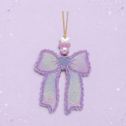 BeFreshie Scallop Bow - Long Tails freshie, glittery lavender with a heart detail and beaded charm.