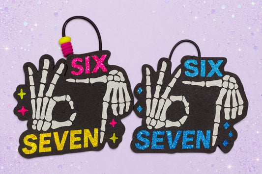 BeFreshie Six Seven car air fresheners with skeleton hand gesture design in pink and blue glitter accents