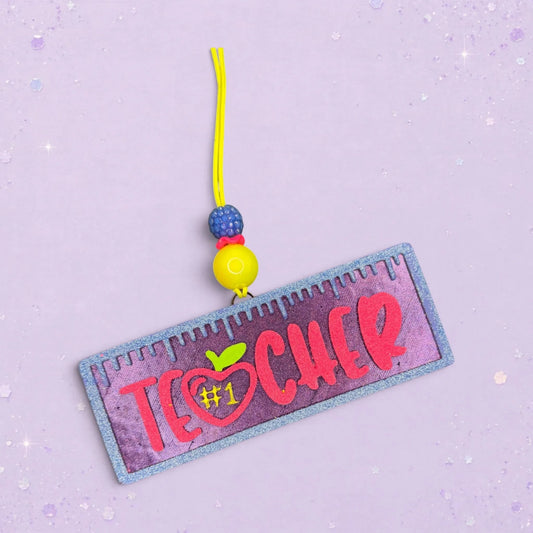BeFreshie teacher ruler freshie with pink lettering, apple, and '#1' inside a heart. Purple glittery ruler design.