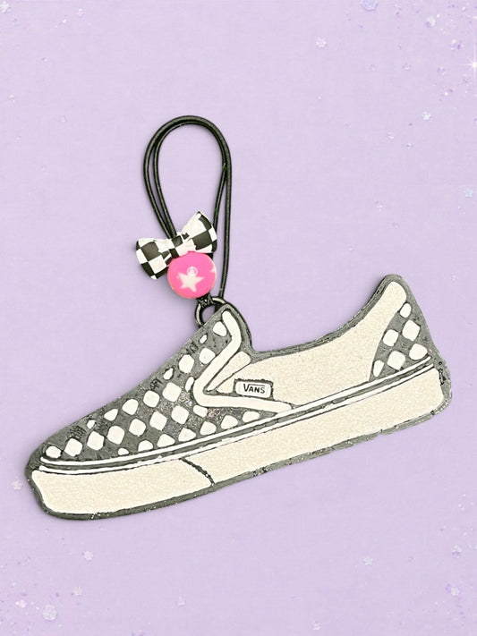 BeFreshie Van freshie car air freshener shaped like a checkered slip-on sneaker with a black and white bow charm.