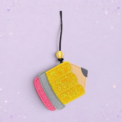 BeFreshie Wide Pencil freshie air freshener, yellow glitter pencil with pink and silver eraser details.
